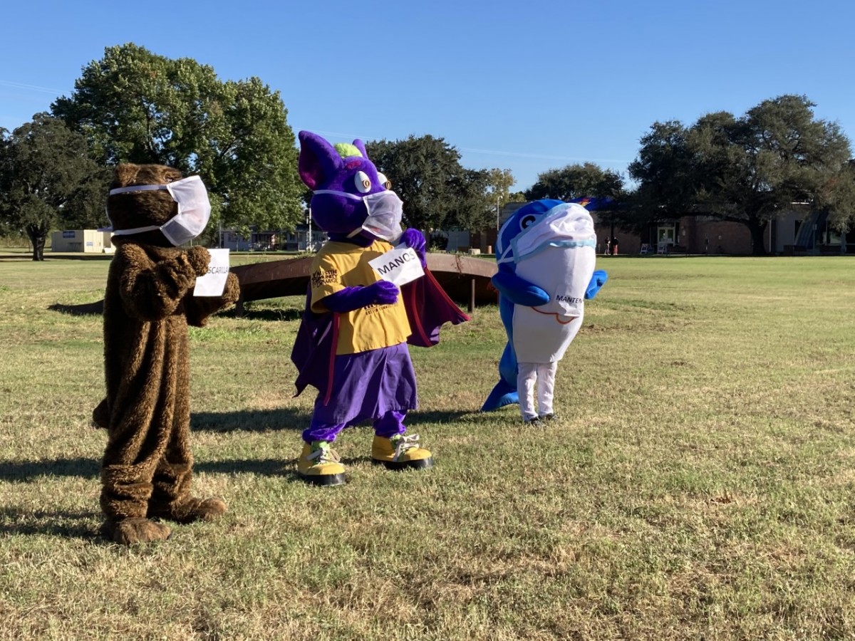 Our Bailey Bear shares the field with mascots from around the district.